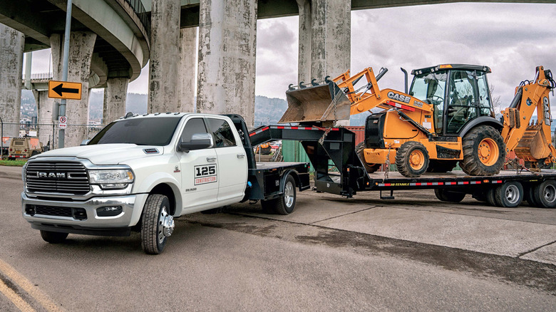 2022 Ram Chassis Cab towing a loaded trailer