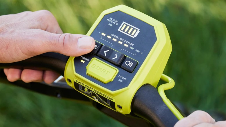 The power controls on a Ryobi 40V lawn mower.