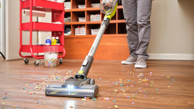 Ryobi 18V One+ Stick Vacuum cleaning a floor