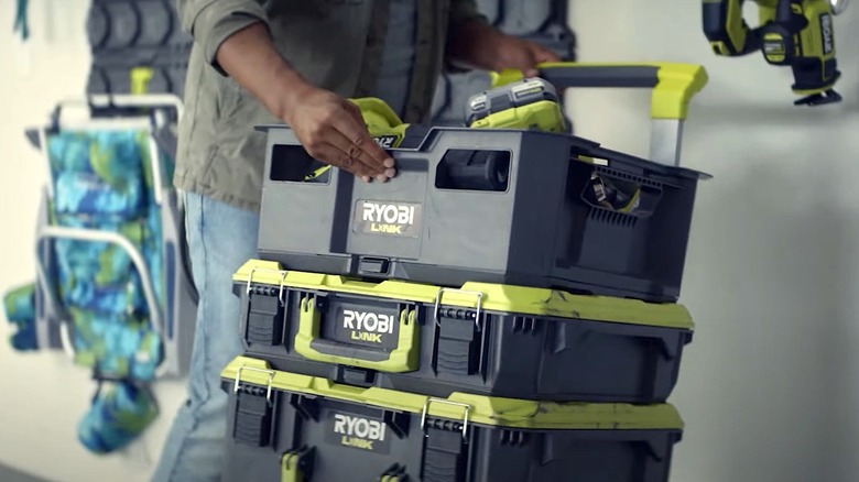 Person using Ryobi Link Storage System