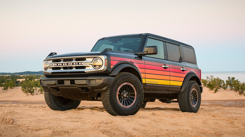 2025 Ford Bronco Free Wheeling, front-left 3/4 view, parked on sand