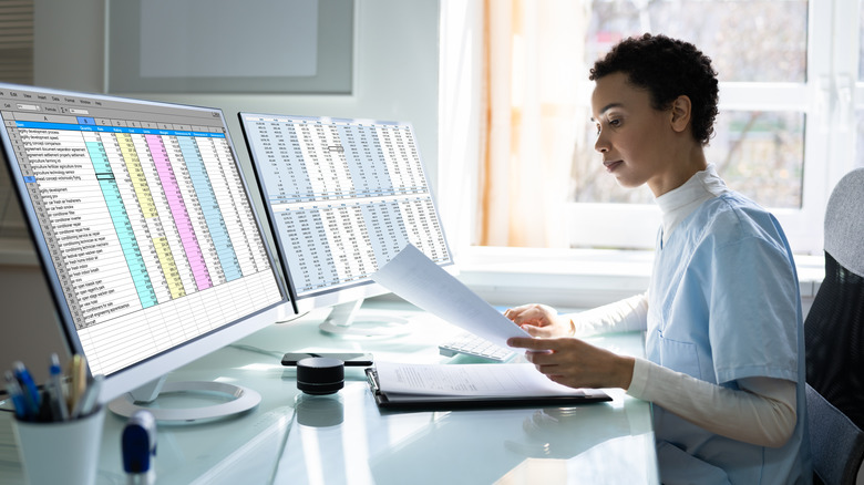 Woman working with spreadsheets