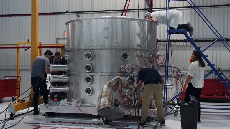 Scientists working on a Titan generator