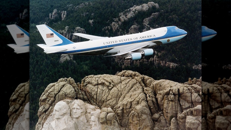 Air Force One flying over Mount Rushmore.
