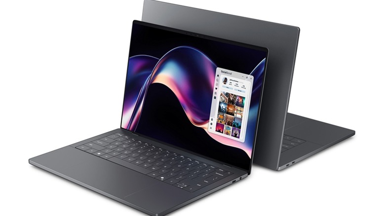 Dell XPS 14 back to back with a Dell XPS 16 laptop.
