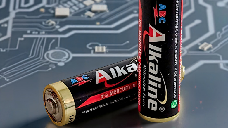Two alkaline AA batteries on a circuit board