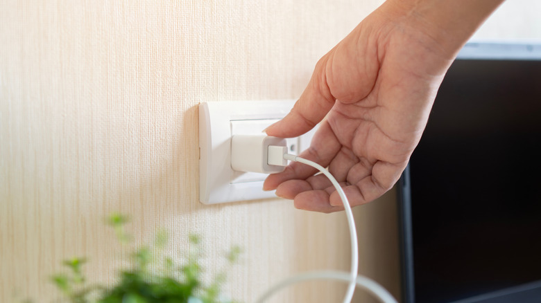Phone charger unplugged from wall socket