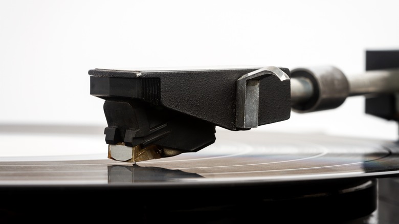 tonearm on vinyl record