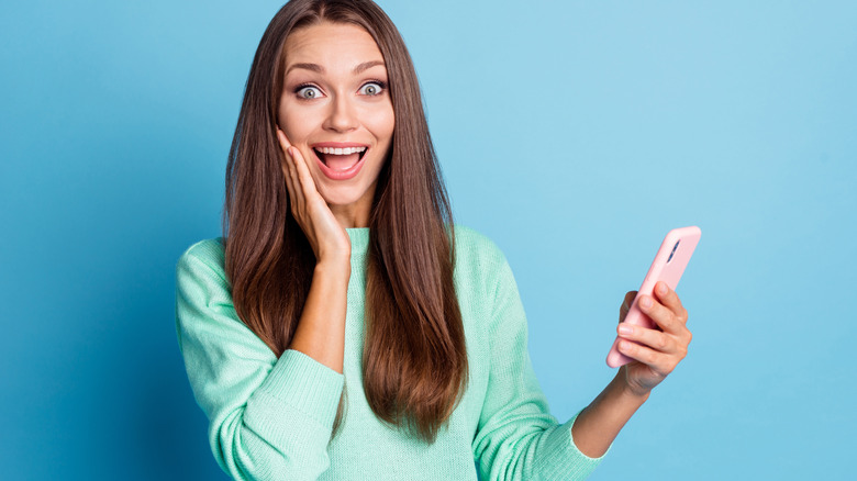 Woman happy with phone