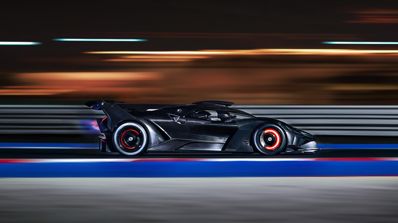bugatti bolide with red hot brakes on the track