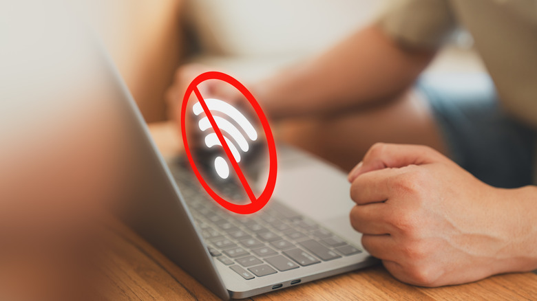 no wifi man at laptop