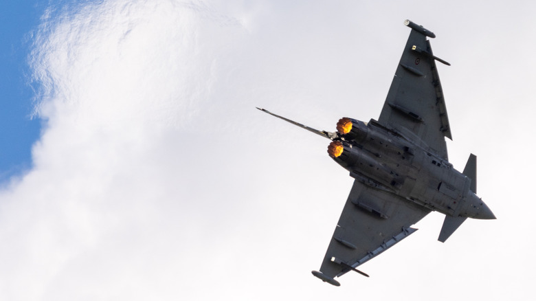 An Airbus Eurofighter Typhoon in flight, viewed from below
