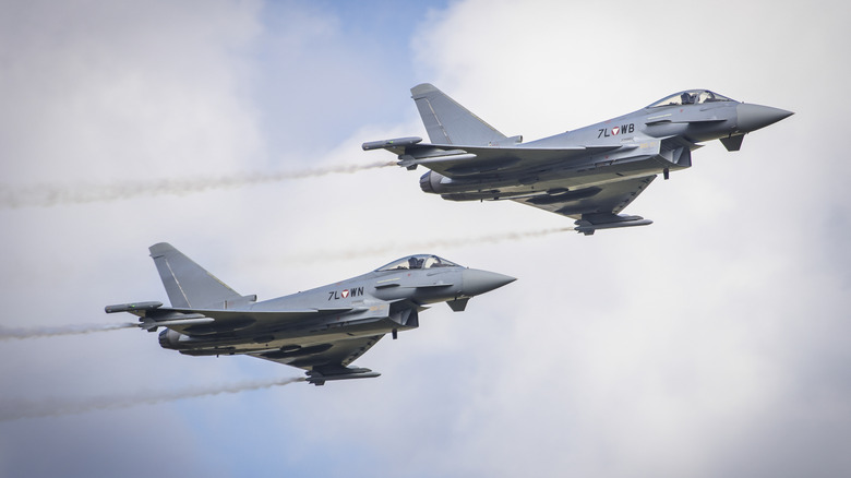 Two Austrian-piloted Eurofighter Typhoons execute a joint exercise.