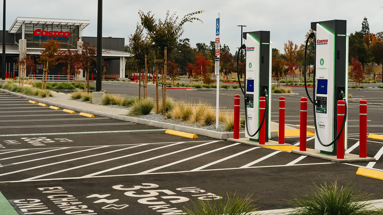 Electrify America charging stations with Costco storefront in background