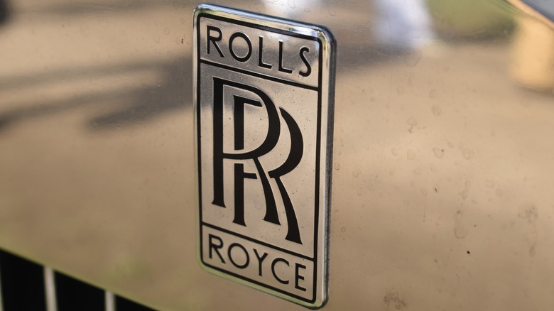 Rolls-Royce emblem on grill of car