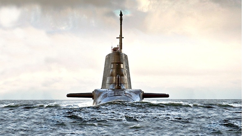 Sail of a submarine breaching the surface of the water