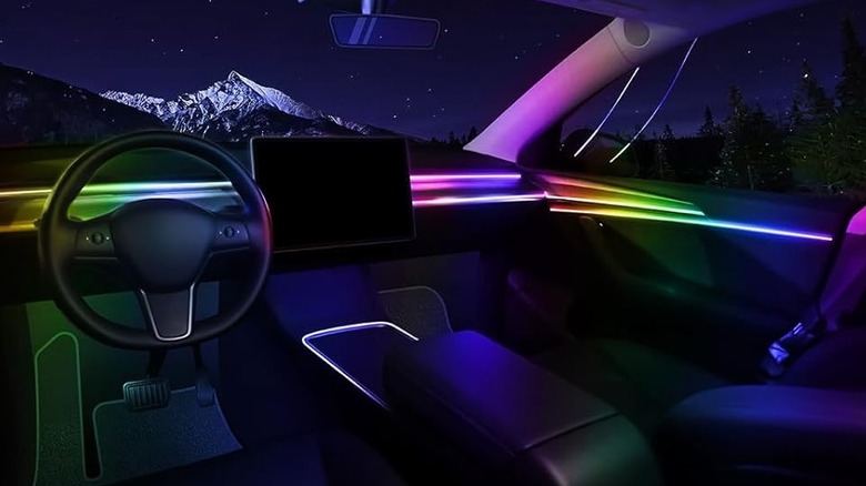 multicolored MAODANER light strips in a car at night