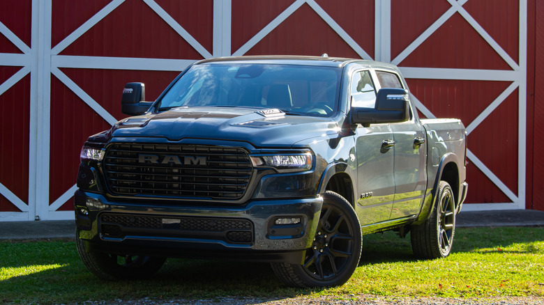 2026 Ram 1500 Laramie in front of barn