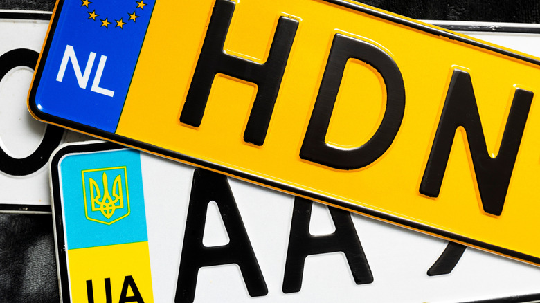 License plates stacked on top of each other.