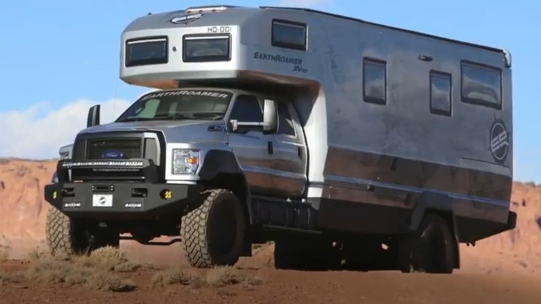 The EarthRoamer HD camper navigating some offroad terrain.