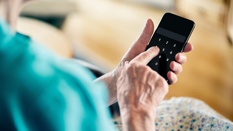 Person using phone unlock