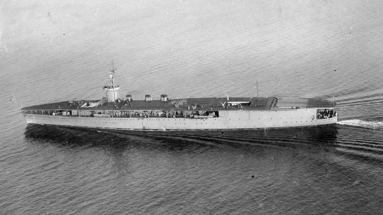 ijn hosho aircraft carrier tokyo bay black white photo