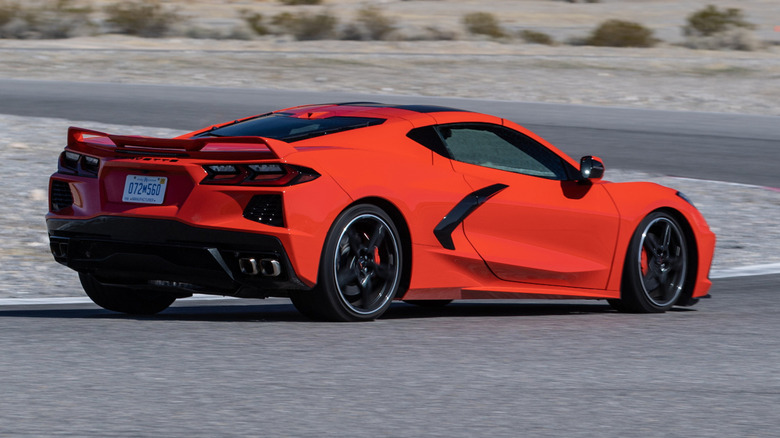 Orange C8 Corvette Stingray on a track
