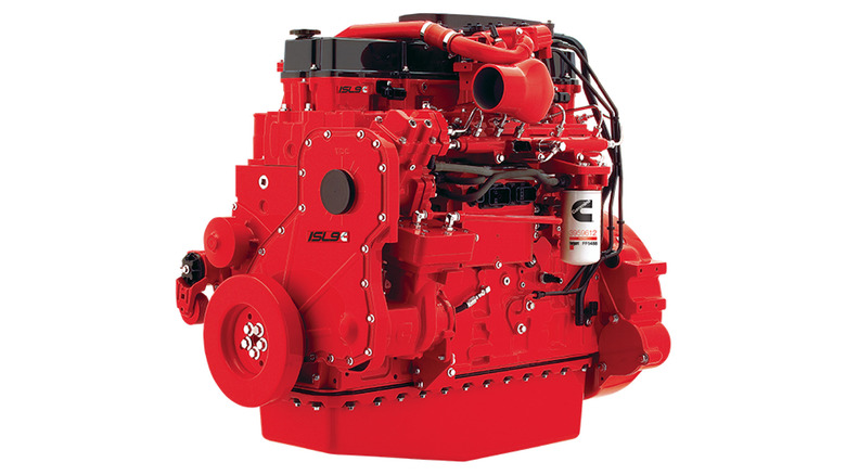 Cummins ISL9 older-generation engine in bright red with a black valve cover