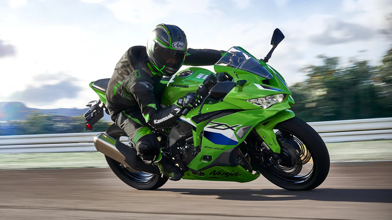 Kawasaki Ninja ZX-4RR being ridden on a racetrack