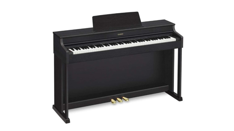 A Casio AP-470 Celviano digital piano on a white background.