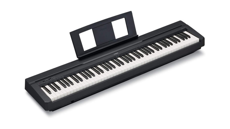 A Yamaha P71 digital piano on a white background.