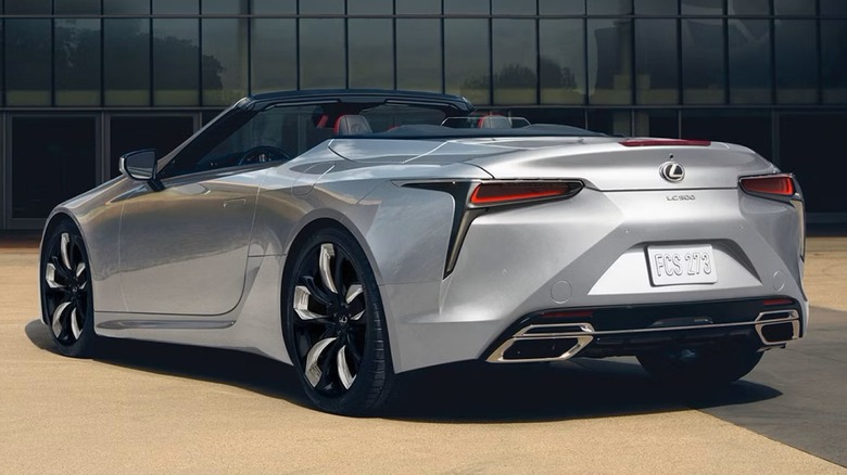 Iridium Lexus LC 500 Convertible parked in front of a glass building