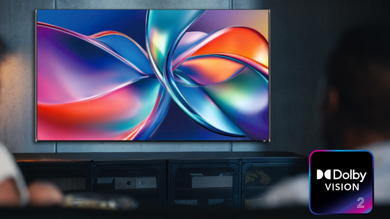 A TV displaying an abstract image, a Dolby Vision 2 logo on the bottom right of the picture.