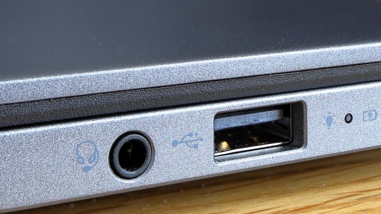 Closeup of USB 2.0 port with USB Trident logo