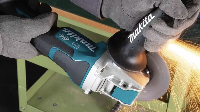 Makita grinder being used on table