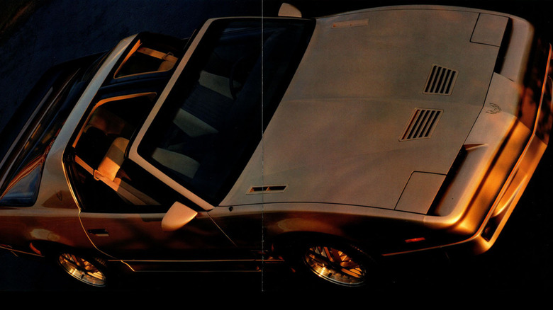 1986 Pontiac Firebird Trans Am foldout brochure advertisement, showing front-right three-quarter view from high angle