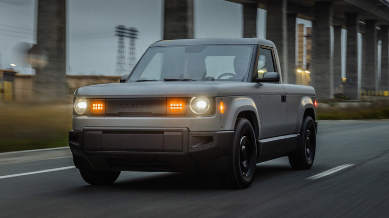 Slate electric pickup on road.