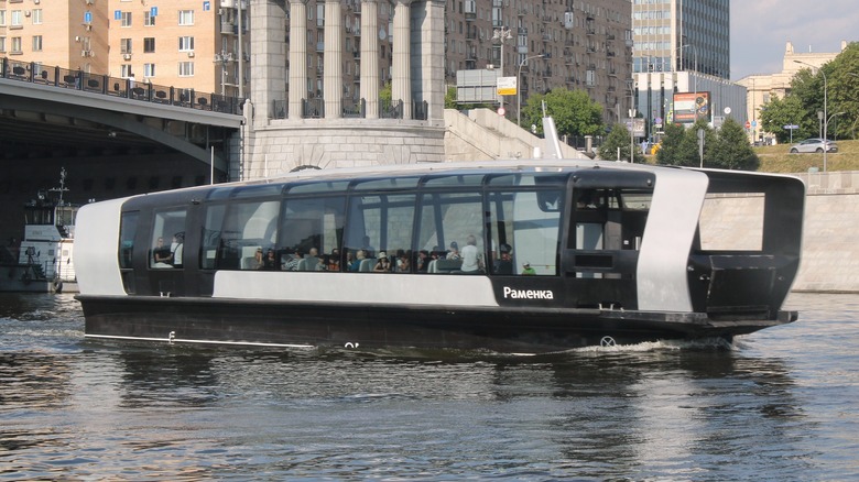 large electric passenger boat on water