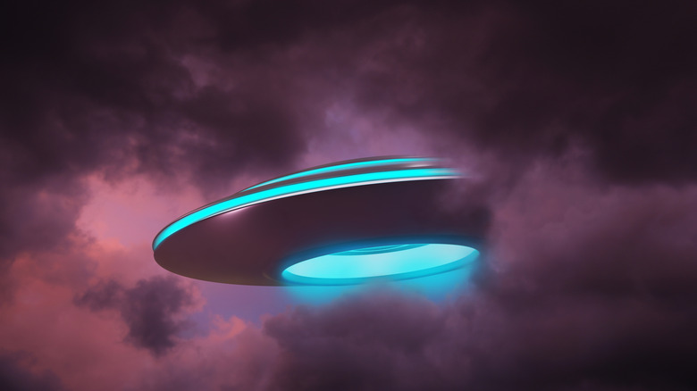 A spacecraft in a cloudy sky.