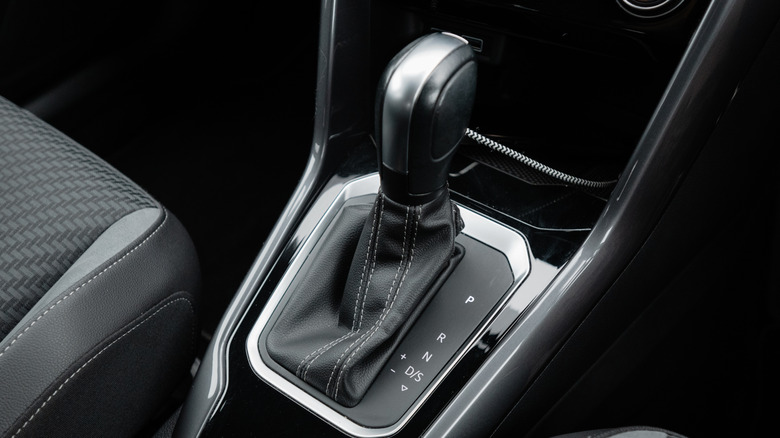 A close-up view of an automatic car transmission lever.