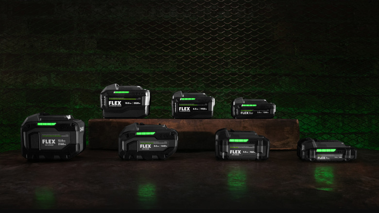 Flex power tool batteries on a table.
