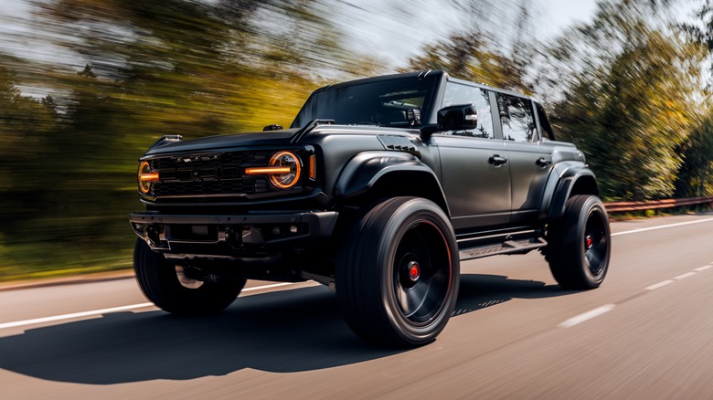 Ford Bronco Raptor driving on highway