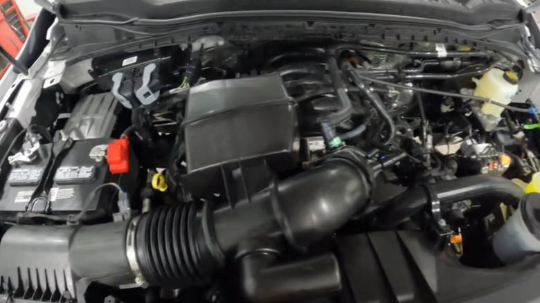 Ford Godzilla engine air intake hoses and filter housing