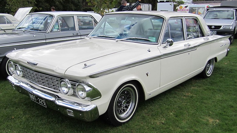 1962 Ford Fairlane parked on grass