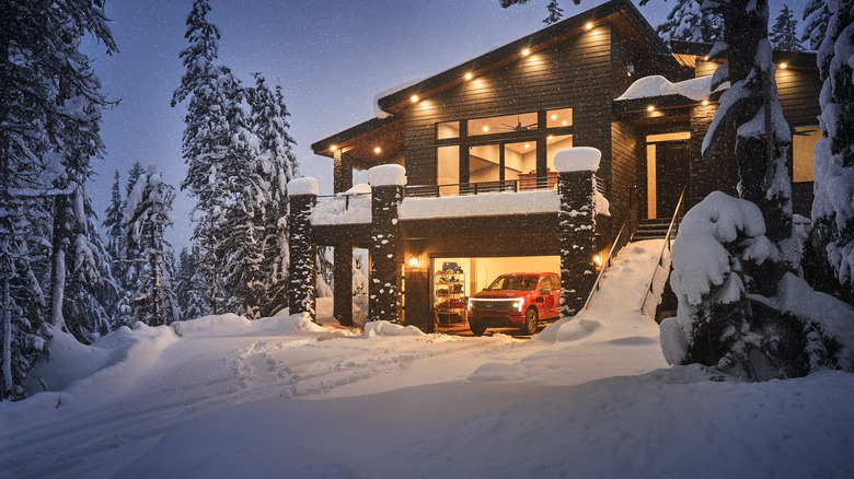F-150 Lightning powering a well lit chalet