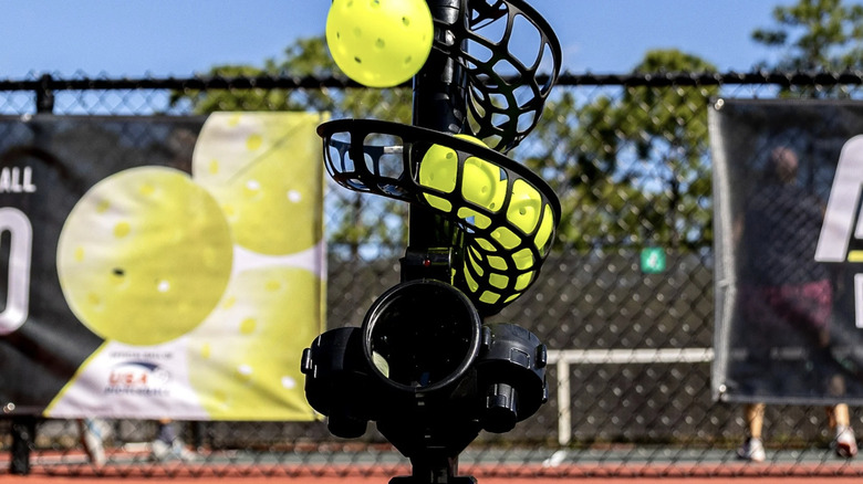 Monarch pickleball launcher firing off a ball