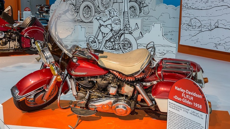 Red 1958 Harley Davidson FL Duo Glide on display