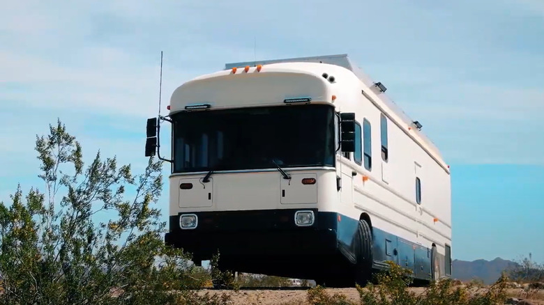 Converted school bus painted white