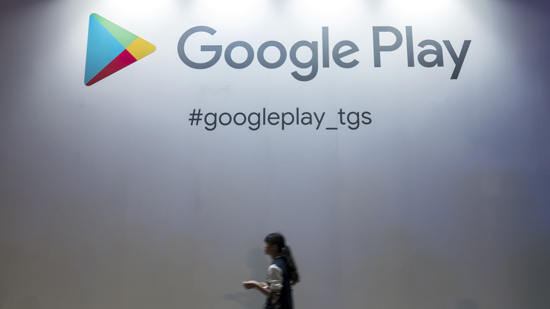 Google Play branding on a wall. 