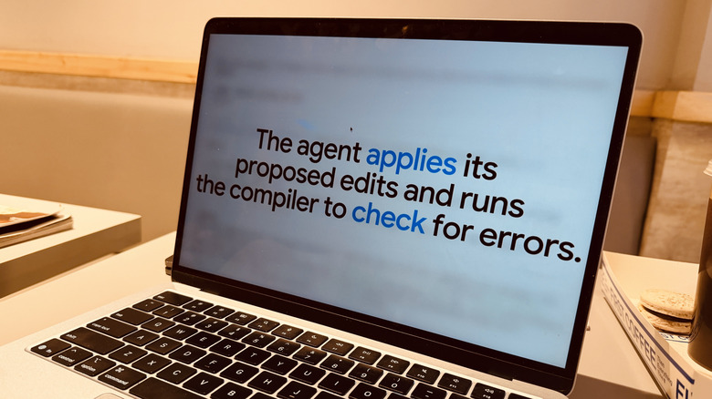 Description of Google CodeMender on a laptop screen